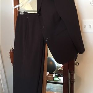 Long and lean black suit by Le Suit!